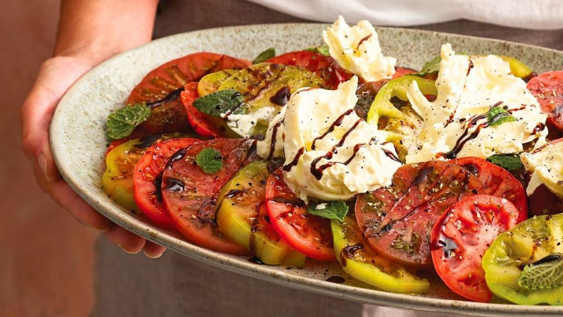 Burrata and tomato salad with saltbush, pepperberry and bush basil recipe